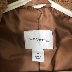 Size: XS (fits on the larger side) - bought from Amazon and wore only once